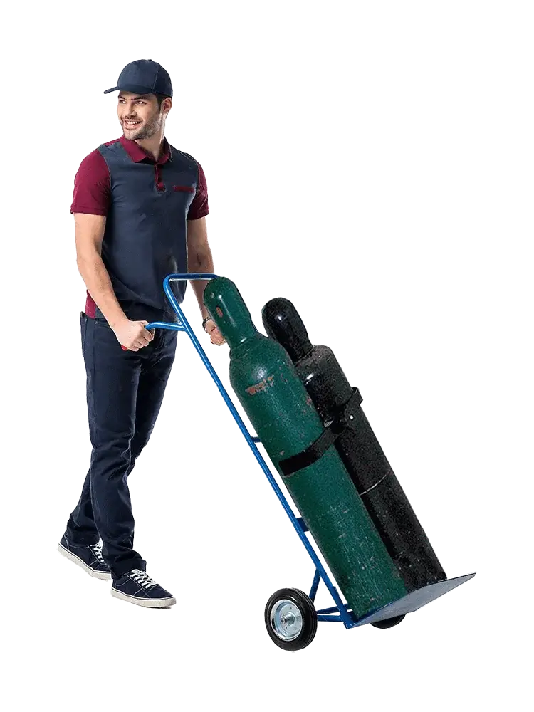 a man pushing a hand truck with two cylinders