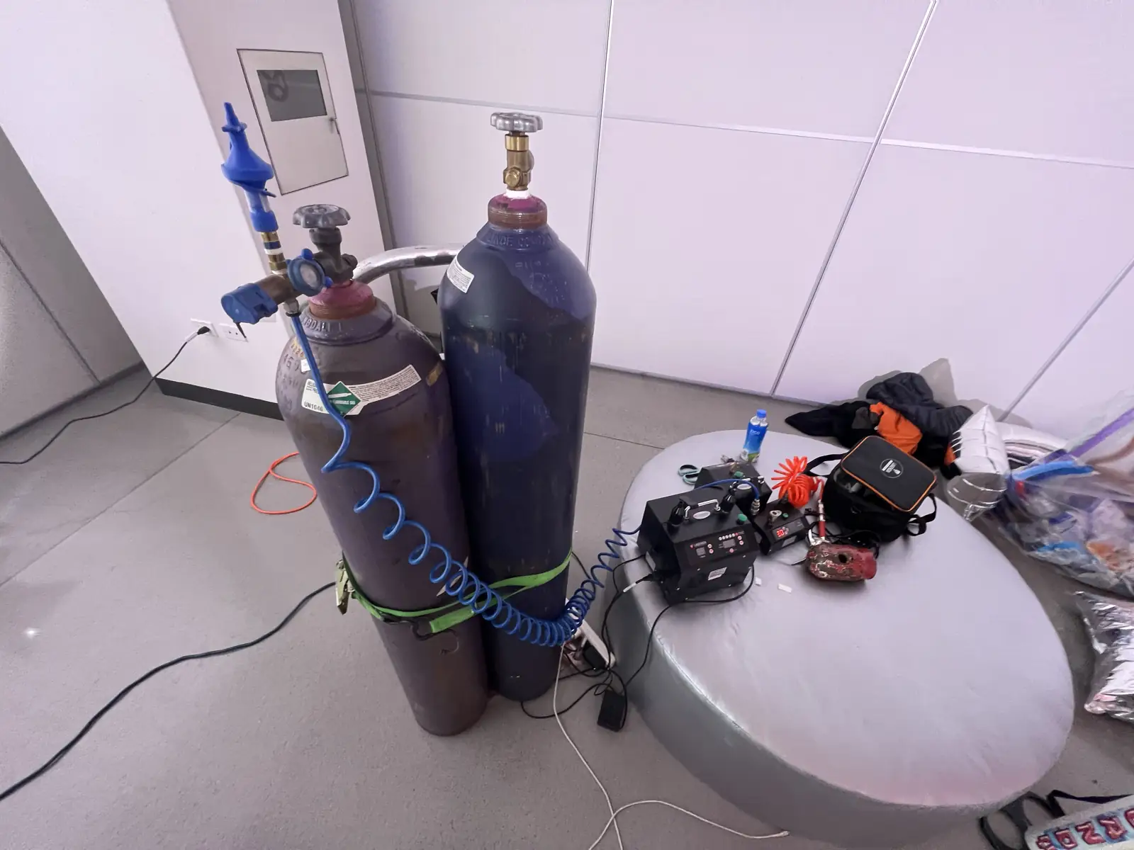 Two helium tanks with regulator at a party venue in Manhattan