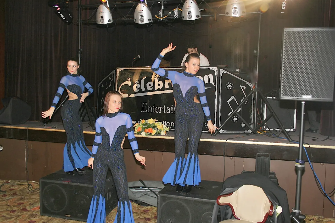 Party dancers performing a show in front of the Celebration Entertainment DJ stage