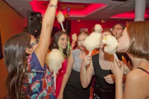 Kids with cotton candy on the dance floor at a bat mitzvah party